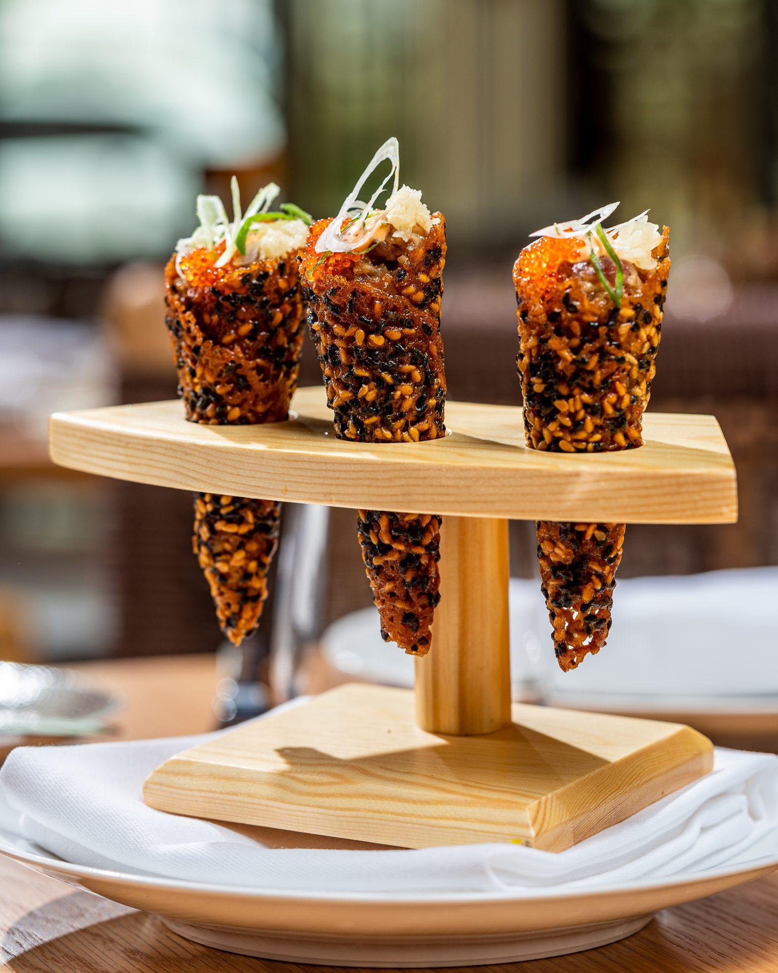 A mouthwatering Spicy Bluefin Tuna Tartare dish served at Spago, a seafood restaurant in Riyadh - Cool Inc