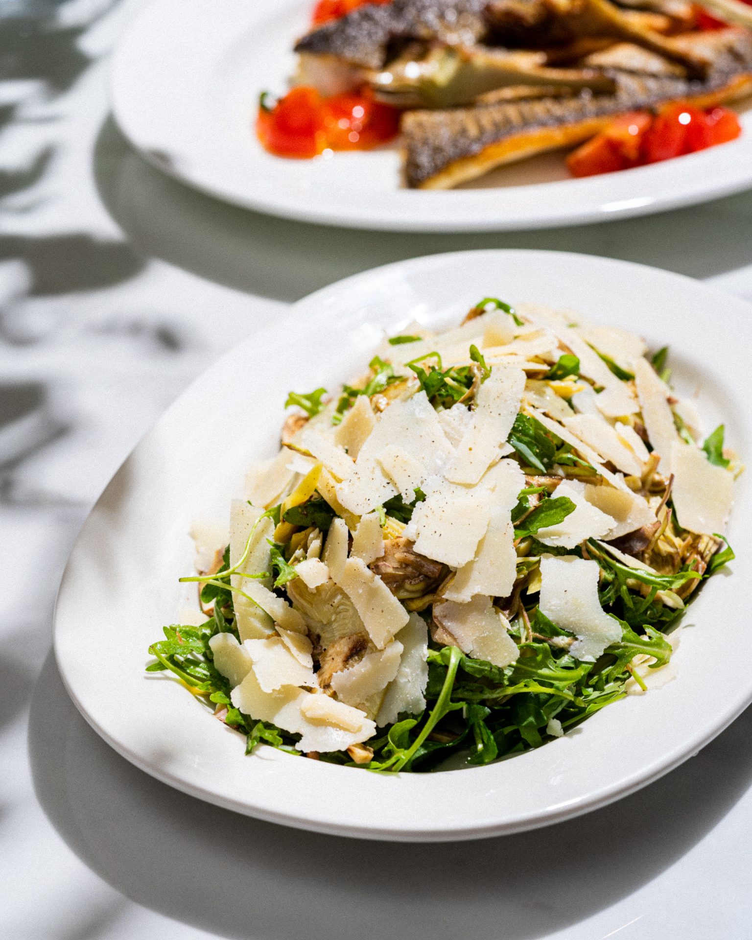 Delicious Artichoke salad with shaved parmesan cheese served by Le Comptoir De Nicole - Fancy Restaurant at Jeddah Yacht Club