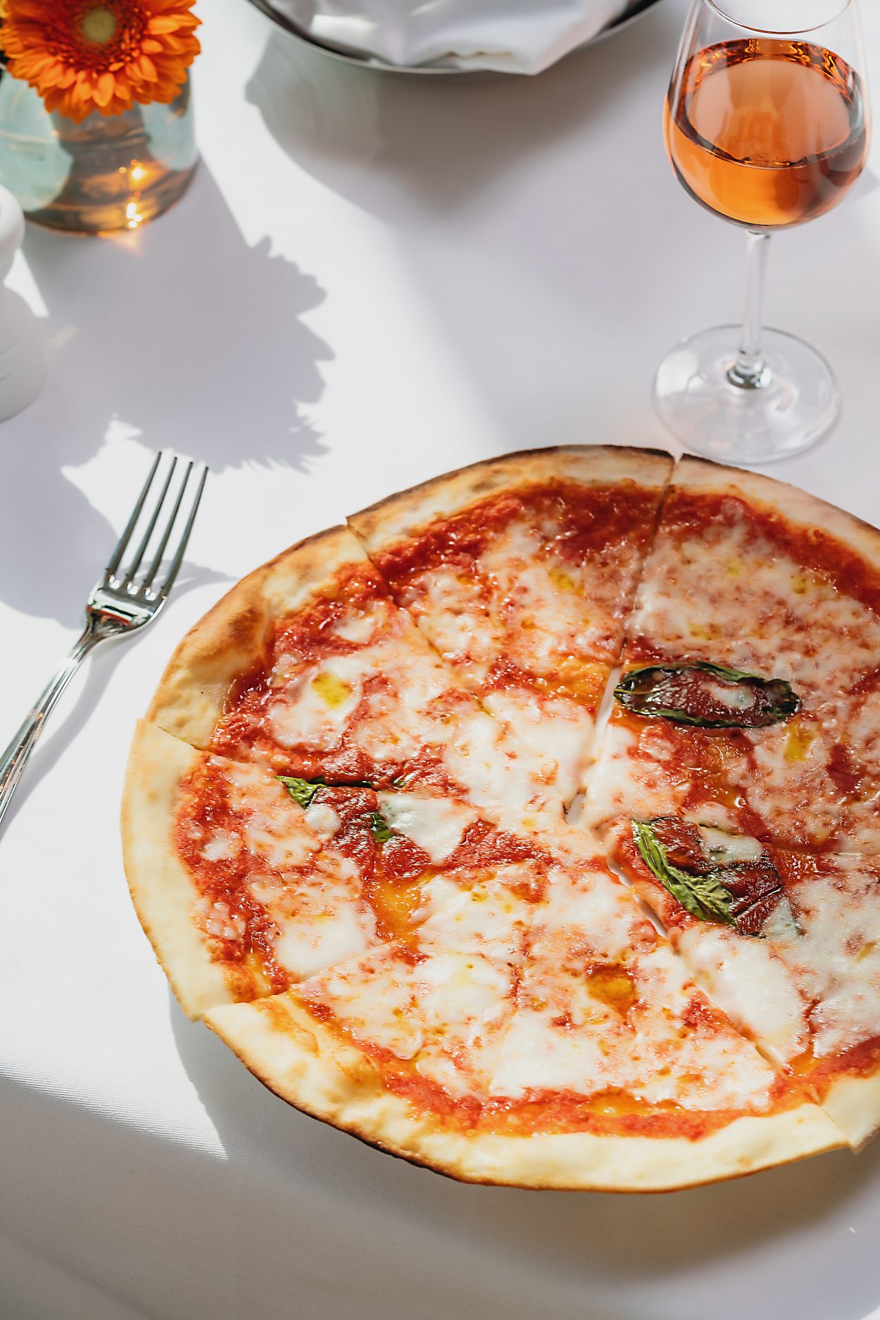 Classic Pizza Margherita: A Perfect Combination of Tomato, Mozzarella & Basil Served at Madeo Fancy Restaurant in Riyadh