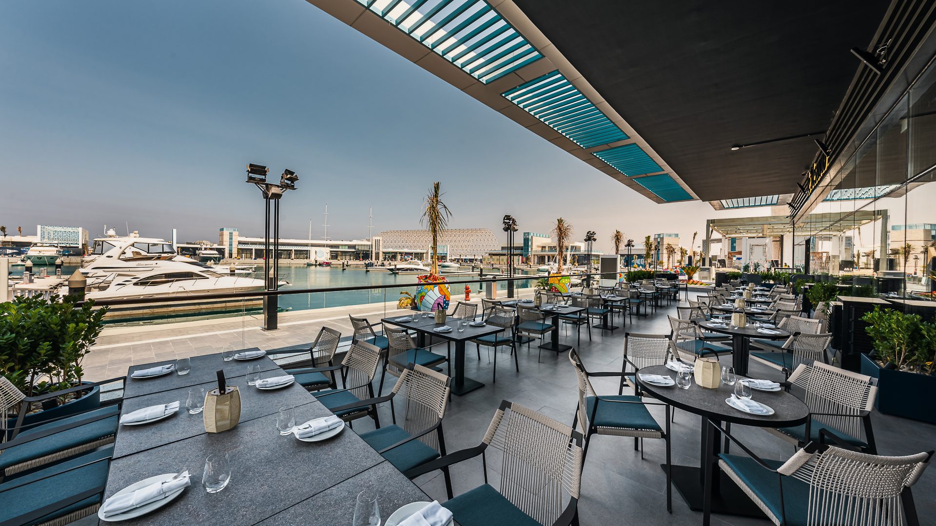 Luxurious outdoor dining area at Le Vesuvio Italian Restaurant in Jeddah Yacht Club - Cool Inc