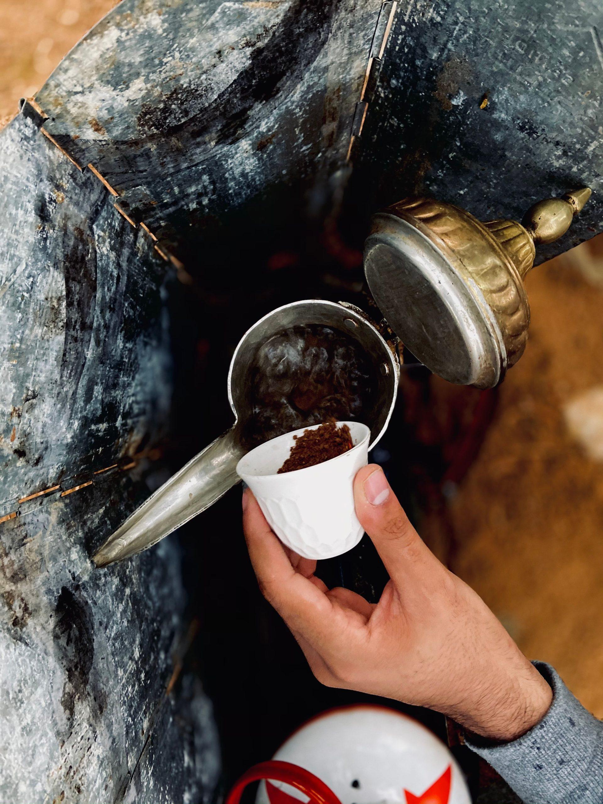 Preparing Saudi coffee, showcasing the hospitality in KSA
