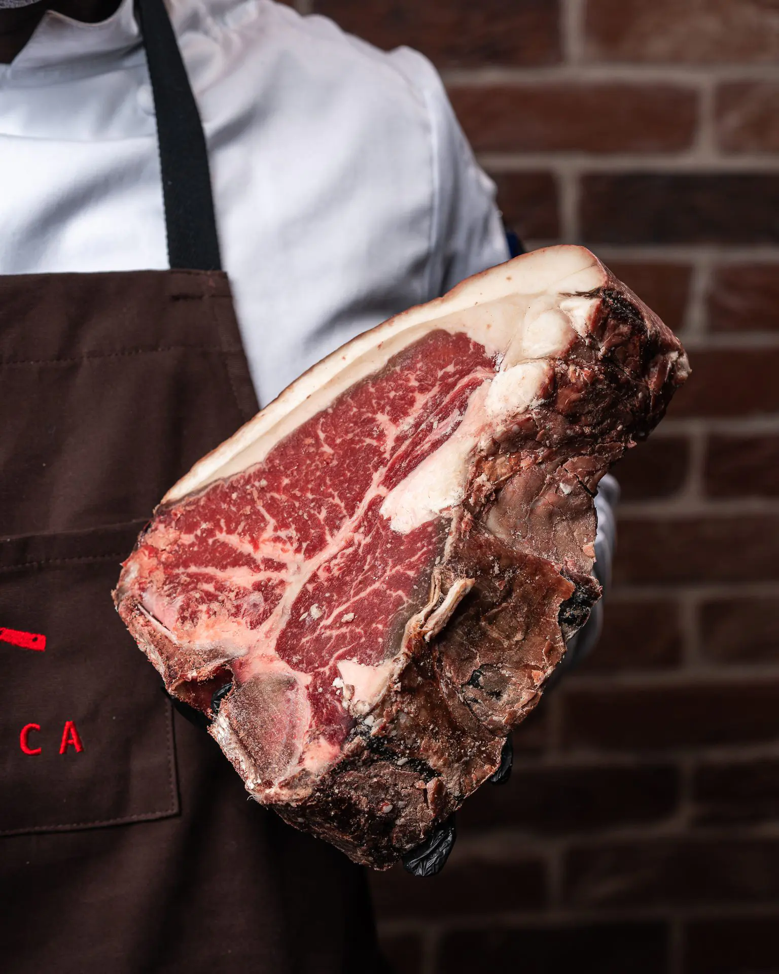 A premium cut of dry-aged beef served at Chi Spacca, Italian Steakhouse Restaurant in Riyadh - Cool Inc